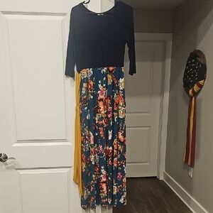Egy Floral Maxi Dress with Navy Top And Teal Floral Shirt.